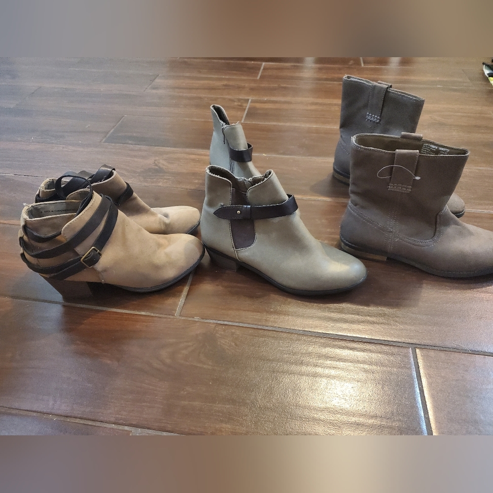 3 pairs of boots, one on right new size 6.5 , middle small heel 6.5 , le…